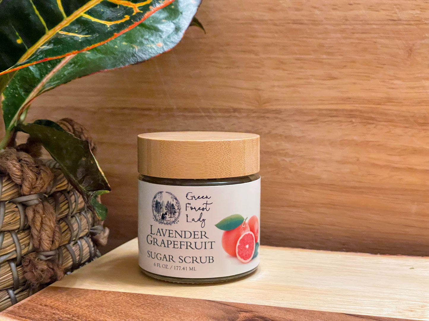 A glass jar of Lavender Grapefruit Sugar Scrub